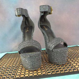 Silver & Black zip heel rugged 6.5" platform heels.